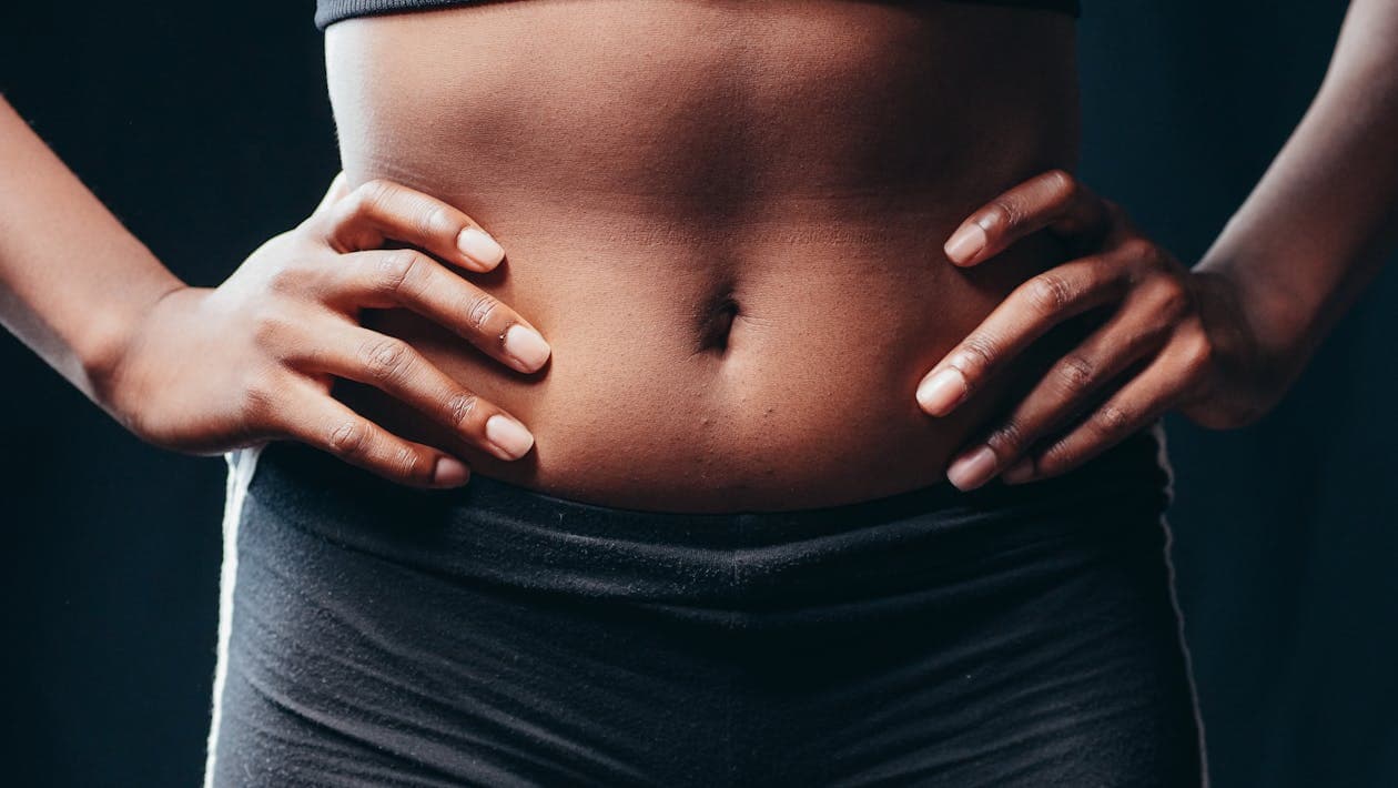 Tummy tuck abdominoplasty results by Dr. Kanuri in Washington DC